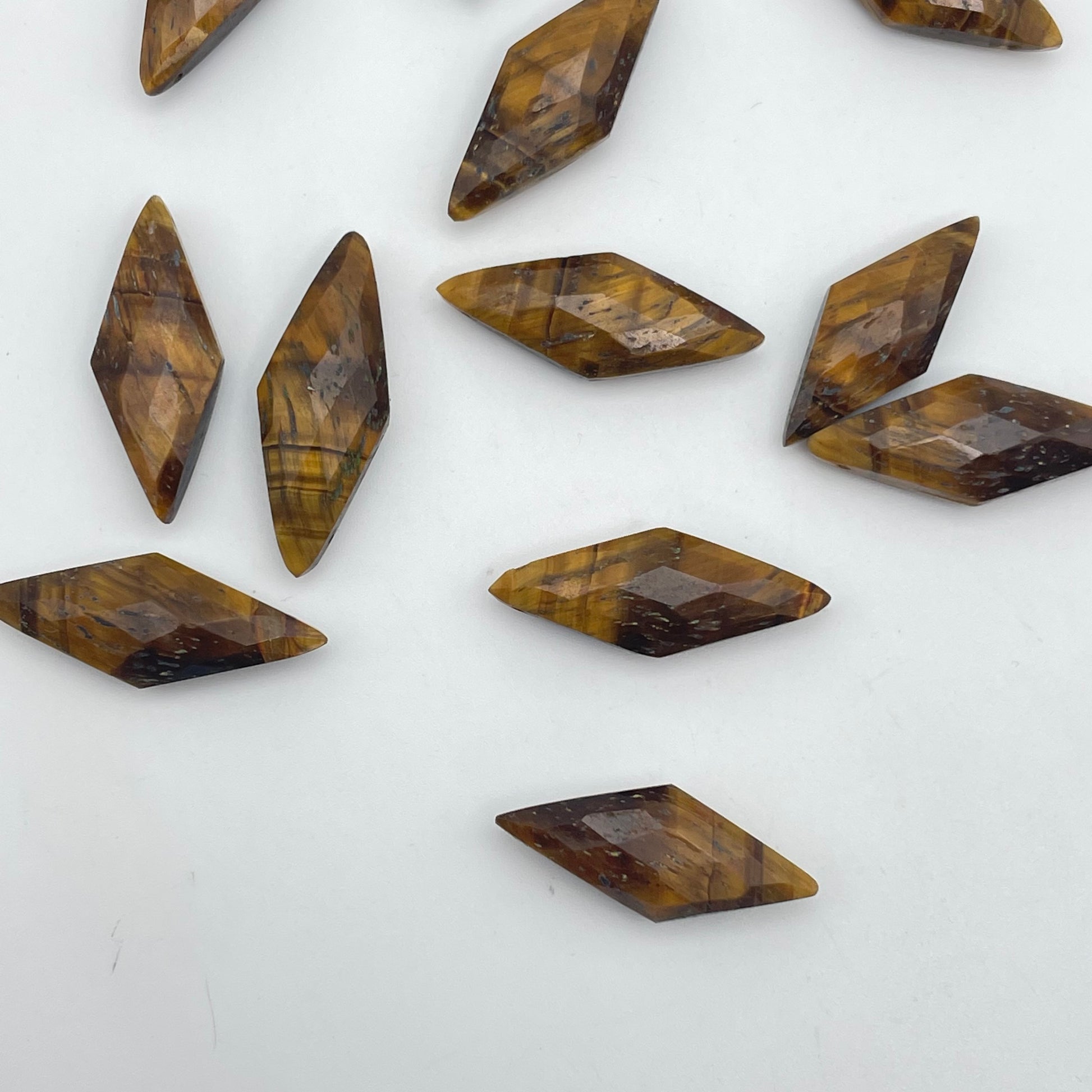 10mm Tiger’s Eye Faceted Rhombus Single Bead.