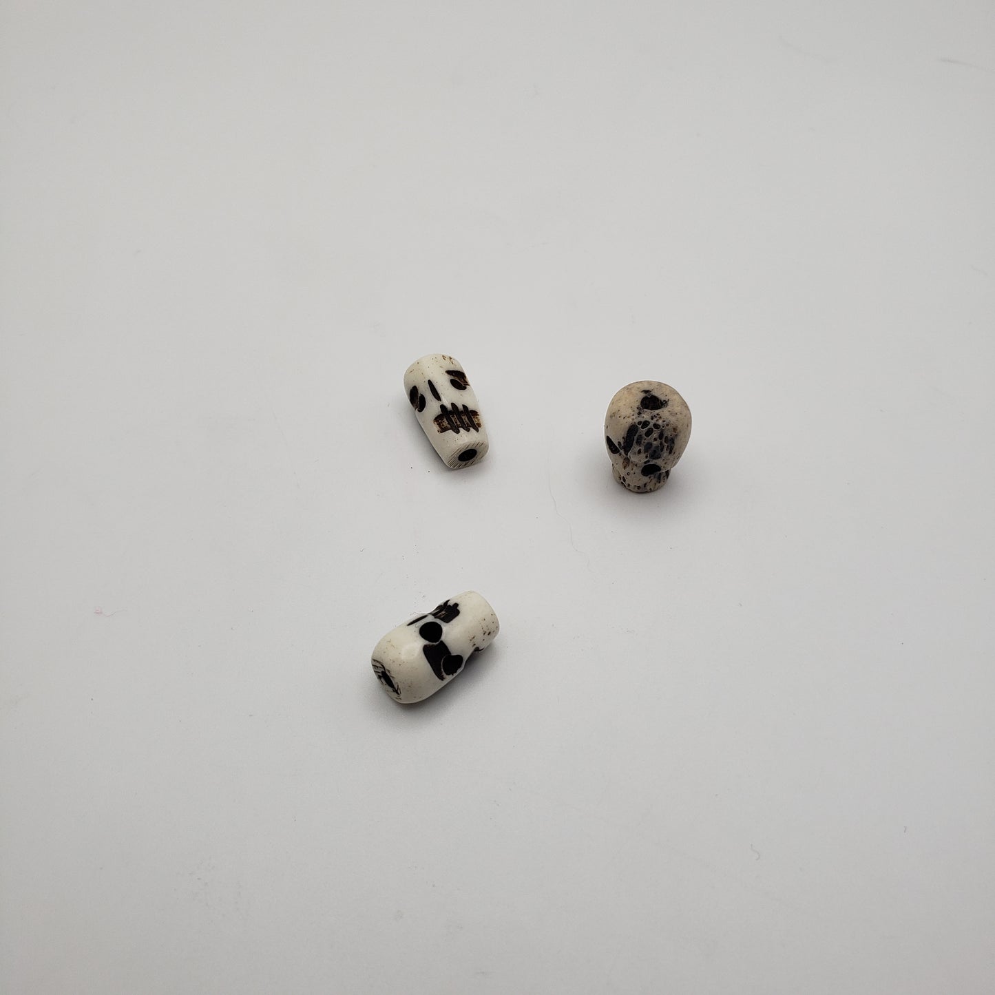 Carved Bone Skull White Bead Single