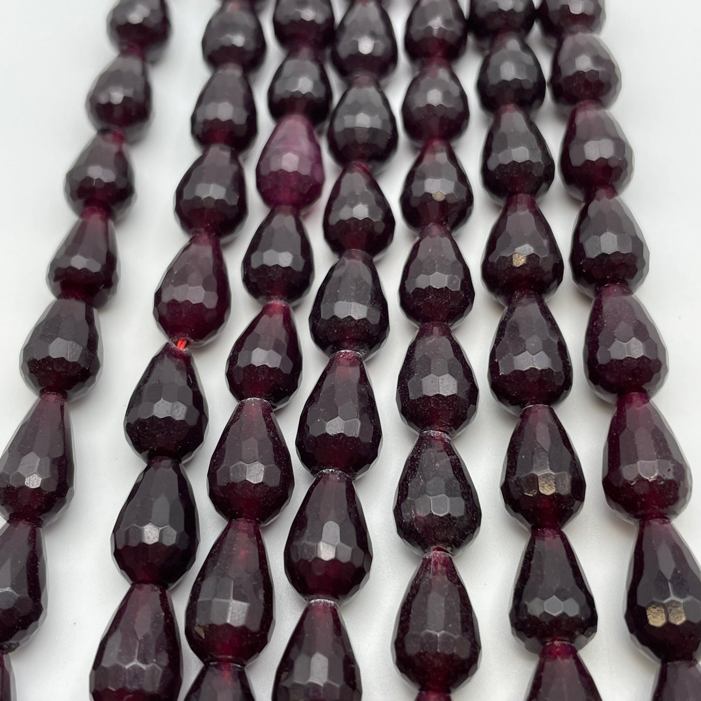 8mm Garnet Center Drilled Pear Cut Strand